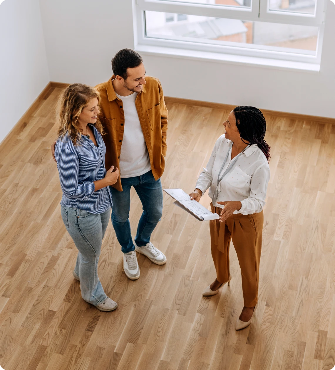 Real estate agent showing new home